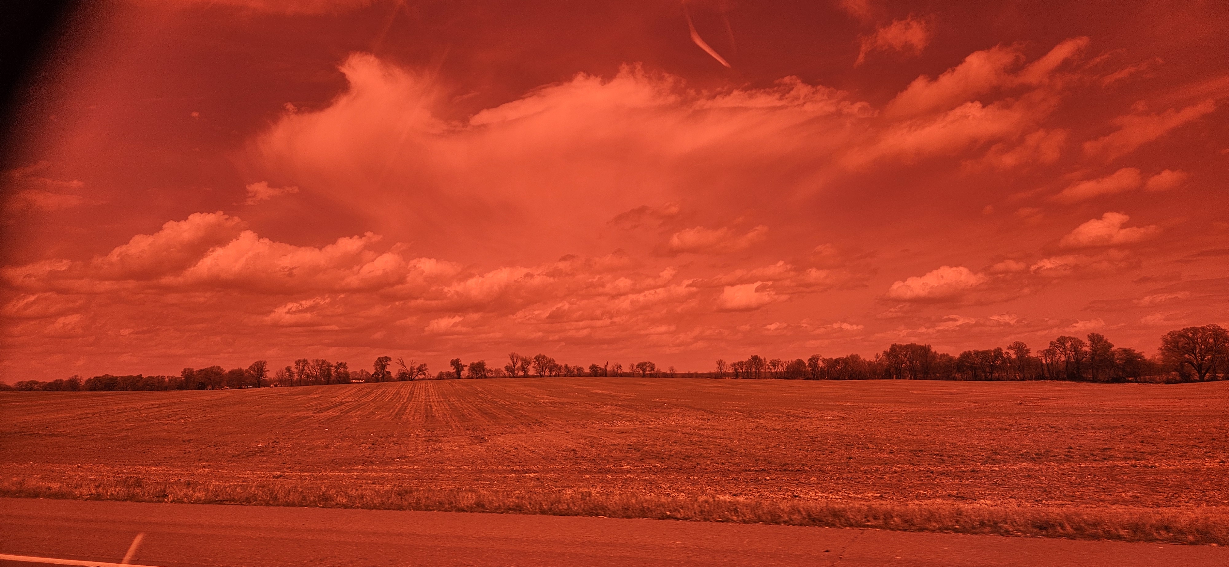 clouds through the lens of my sunglasses