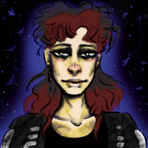 A picture of the website owner with curly red and black hair